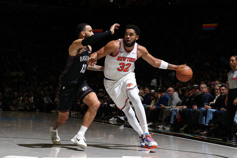 Knicks pull away to top Nets in cross-city showdown image