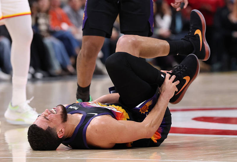 Booker out at least week with ankle sprain image