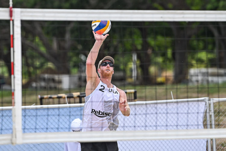 Ex-NBA cager shining on sand image