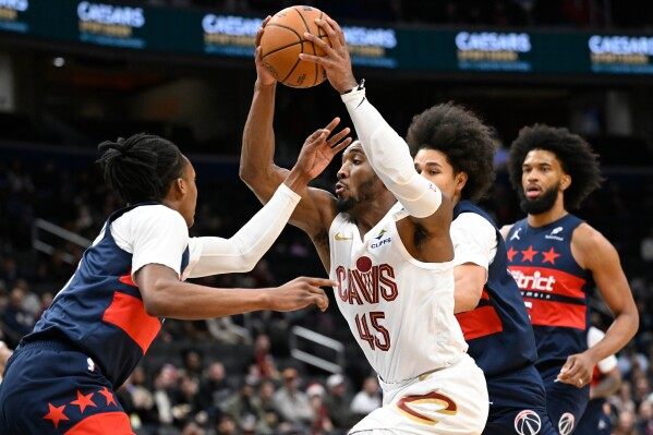 Mitchell’s 48 rally Cavs past Wizards image