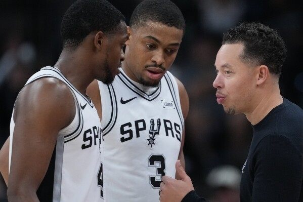 Adversity has been a constant for Mitch Johnson in his Spurs’ tenure. He’s handling things with ease image