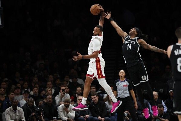 Heat halt skid with Nets victory image