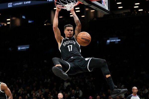 Porter shines as Nets beat Nuggets image