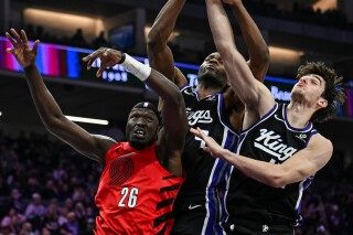 Hawks request waivers on injured center Duop Reath 4 days after trade with Trail Blazers image