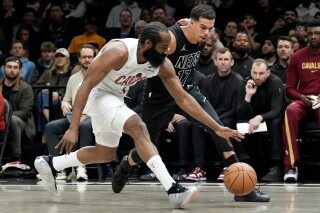 Harden scores 22 points with broken thumb, leads Cavaliers over the Nets 106-102 image