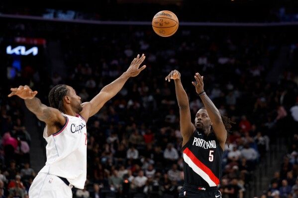 Holiday scores 30, Avdija adds 28 to help Trail Blazers beat Clippers image