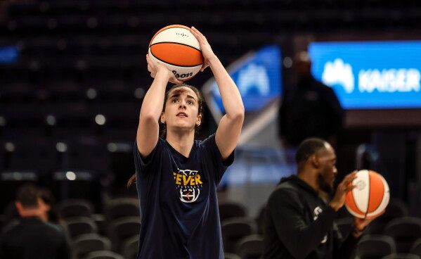 Caitlin Clark cheers for a 7-game NBA Finals, savoring ‘great basketball’ image