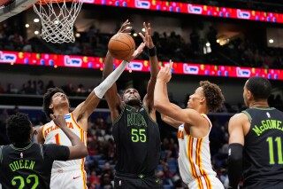 Looney faces former Warriors in return image